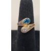 Image 1 : 10K Gold Blue Topaz & Diamond Hug Ring - Size 3 - Weight: 2.9g