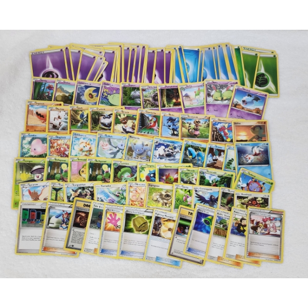 OVER 50 Assorted Vintage Pokemon Trading Cards