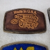 Image 2 : Four Assorted Vintage Collectible Belt Buckles Ft. JOY, Kennametal, West Virginia & Northern Coal Co