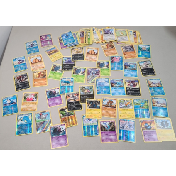 Over 100 Assorted Pokémon Trading Cards 