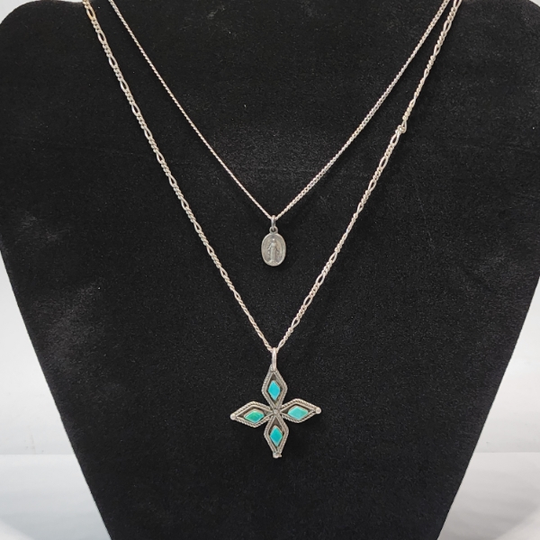 Two Sterling Silver Necklaces, Flower Pendant with Blue Stones & Religious Pendant TW: 7.6g