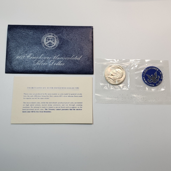 United States Mint 1973 40% Silver Uncirculated Eisenhower Dollar in Original Blue Packaging