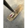 Image 4 : SeeMore putter - features a patented system with a red dot on the putter head and a black shaft