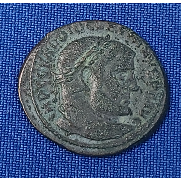 Ancient Roman Bronze Follis Coin, Minted During The Reign Of Emperor Diocletian (284–305 AD)