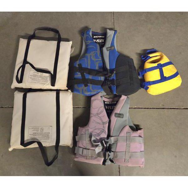 Great Condition Life Preserver Collection Including 2 Seat Floats, Small Dog Jacket, And 2 Adult Lar