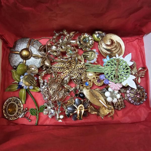 Various Vintage Costume Jewelry Brooches and Pins, featuring Floral Designs and Gold-Tone Finishes