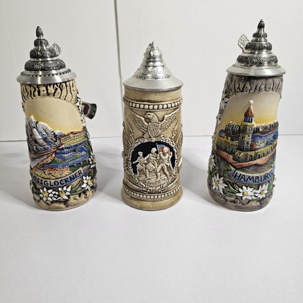Collection of Three Collectible, Relief-Molded Lidded Beer Steins