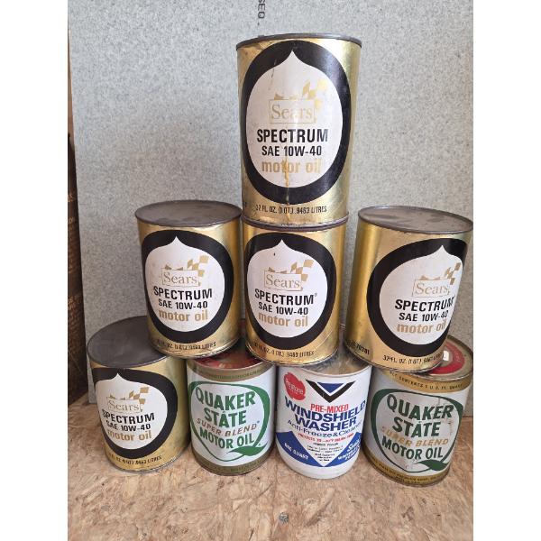 Eight Full Vintage Quart Oil Cans