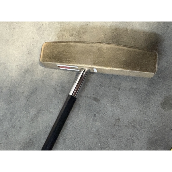 SeeMore putter - features a patented system with a red dot on the putter head and a black shaft