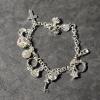 Image 1 : Sterling Silver Charm Bracelet - approx 8" - 22.5g TW