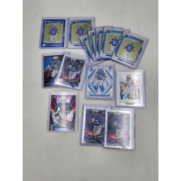 Assorted Ladd McConkey Football Trading Cards in Protective Holders