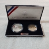 Image 1 : 1991-1995 World War II 50th Anniversary Two-Coin Proof Set Including 90% Silver Dollar 