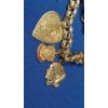 Image 2 : 14K Gold Charm Bracelet With Some 14K & 10K Gold Charms & 2 Gold Coins - TW: 57.1g 