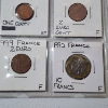 Image 7 : Two Binder Pages Filled with Assorted World Coins: Switzerland, France, Sweden, Italy, & More!
