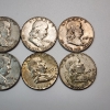 Image 4 : 10 Assorted Years United States 90% Silver Franklin Half Dollars - FV: $5.00