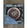 Image 1 : New In Box- 10'' Alloy Wheel Wall Clock