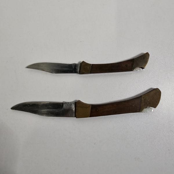 Pair of Vintage Pakistani Buck Style Folding Pocket Knives