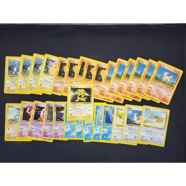 Over 20 Vintage Base Set Pokemon Trading Cards Including Electabuzz