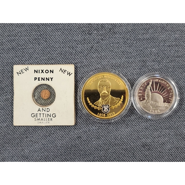 Lot of Three Assorted Coins Including 1986 Commemorative Half Dollar, Nixon Penny & 2019 Roosevelt