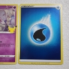 Image 3 : Two Mint Condition Pokemon Trading Cards Holo Rare 25th Anniversary Cosmoem & Holo Water Energy