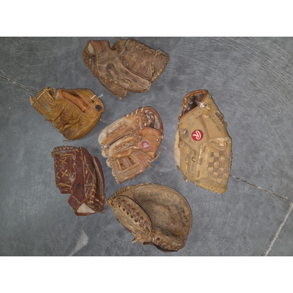 Collection of Six Ball Gloves In Good Condition