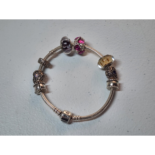 Sterling Silver Pandora Bracelet With Assorted Sterling Silver Charms TW: 34.3g