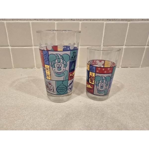 (2) Disney Christmas Glasses - 6" & 4.5"