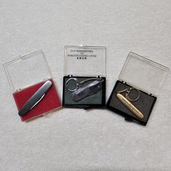 Three Vintage Promotional Keychain Pocket Knives housed in their Original Plastic Presentation Cases