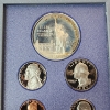 Image 3 : 1986 U.S. Liberty 7-Coin Prestige Set Including 90% Silver Liberty Dollar - OGP Packaging & CoA