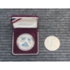 Image 1 : 2002 American Silver Eagle and 1988 US Olympic Dollar