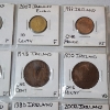 Image 3 : Two Binder Pages Filled with Assorted World Coins: Ireland, Russia, Great Britain, Isreal, & More! 