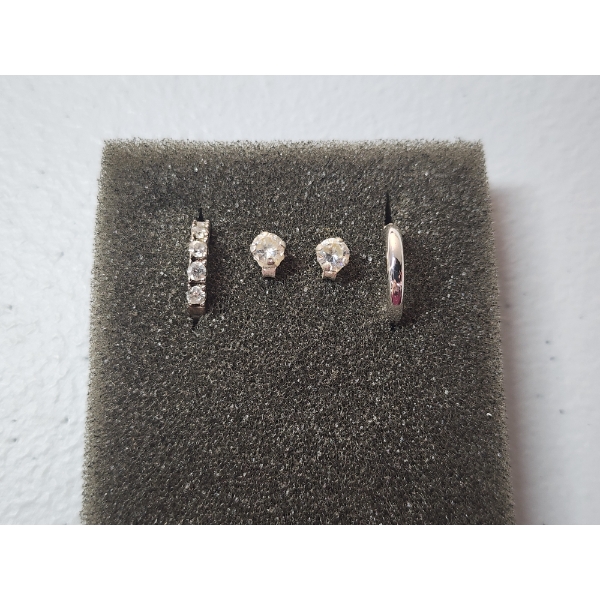 Assortment of Sterling Silver Jewelry: 1 Pair of Stud Earrings & 2 Single Hoop Earrings TW: 2.5g