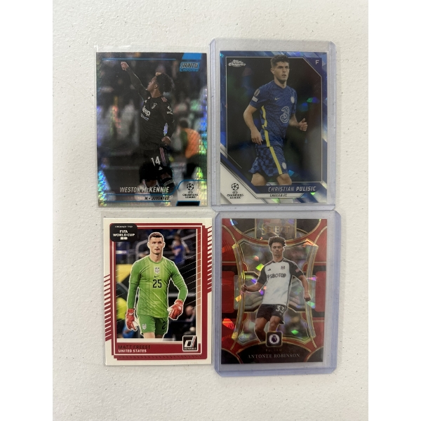 Four Soccer Trading Cards including Weston McKennie, Christian Pulisic, Matt Freese, and Antonee