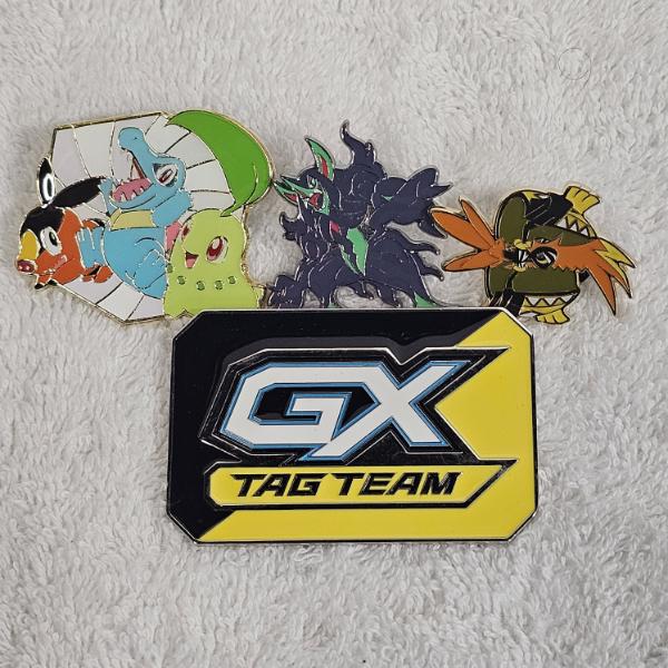 Pokémon GX Tag Team Marker Badge Pin Set ft. Tepig, Totodile, Chikorita, Grimmsnarl, and Tapu Koko