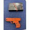Image 2 : Snake Eyes Tactical folding pocketknife featuring a handgun-shaped handle with orange camo finish