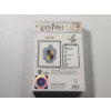 Image 2 : 2021 Niue Harry Potter Hufflepuff House 1 oz .999 Fine Silver Crest Shaped Coin - Mintage 5,000