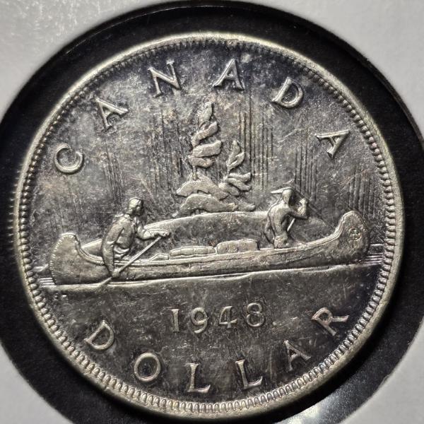STUNNING EXAMPLE:  1948 Canada Silver Dollar  In Extremely High MS Grade (Est)