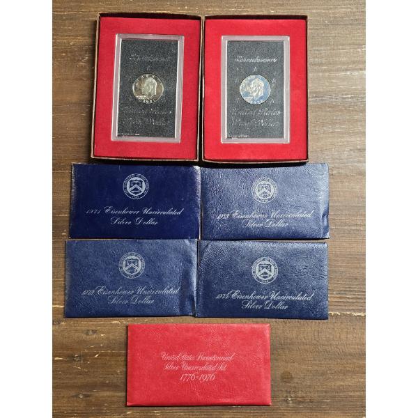 (2) Eisenhower Dollars in Display Cases & (5) Silver Proof Sets 1971-1974 & Bicentennial