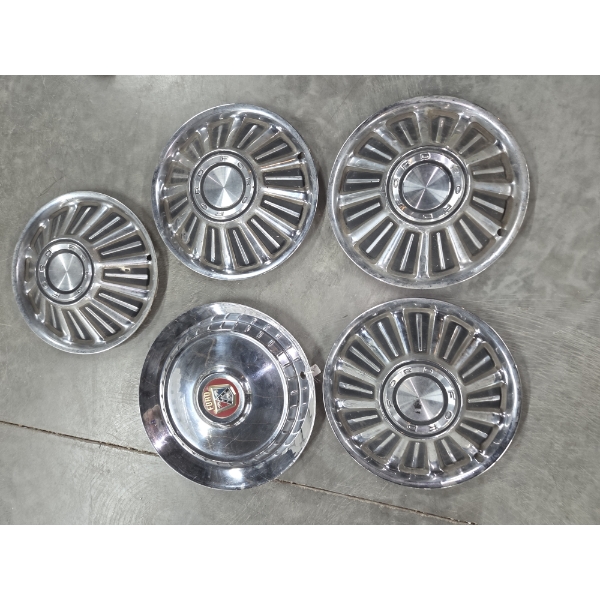 Five Vintage Ford Hubcaps