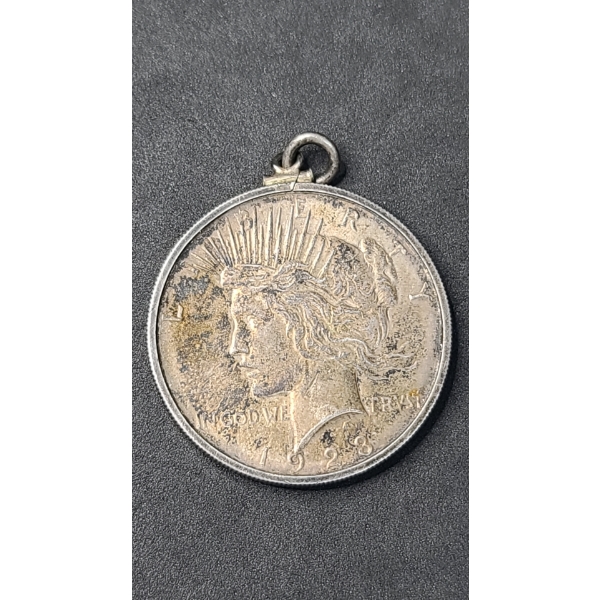 1923 90% Silver Peace Dollar In Bezzle