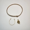 Image 1 : 10K Yellow Gold Jewelry: Bangle, Tasmanian Devil Pendant, Loop Piece - Total Weight: 5.1g
