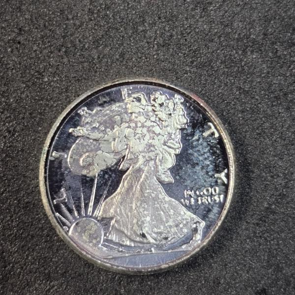 1/10 Troy Ounce .999 Silver Round with Walking Liberty Motif
