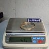 Image 6 : 10K Yellow Gold Jewelry: Bangle, Tasmanian Devil Pendant, Loop Piece - Total Weight: 5.1g