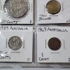 Image 7 : Two Binder Pages Filled with Assorted World Coins: Cuba, Argentina, Australia, India, & More!