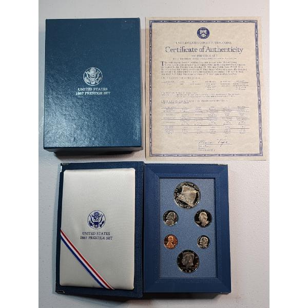 U.S. Mint 1987 Prestige Set Including 90% Silver Dollar - In Original Packaging w/ CoA