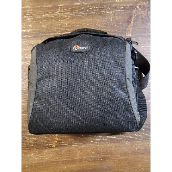 Black Lowepro Format 160 9" Camera Bag with Various Camera Accessories