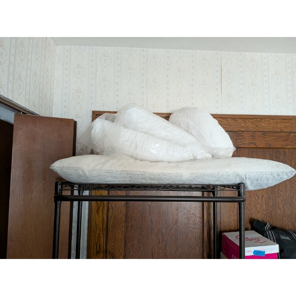 Two New Bed Pillows, Body Pillow, And Round Plush Pillow