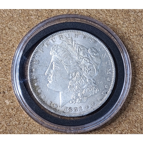 1883-O 90% Silver Morgan Dollar In Coin Capsule