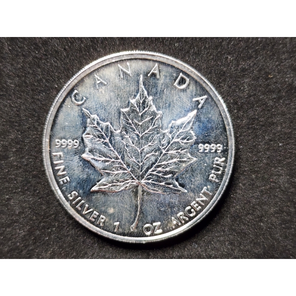 1999 Silver .9999 Fine 1 Oz Canadian Maple Leaf Round 