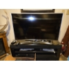 Image 1 : Samsung TV With Remote, Sony TV Stand W Built In Speakers, Sony Blu Ray Player, And Panasonic 5 Disc